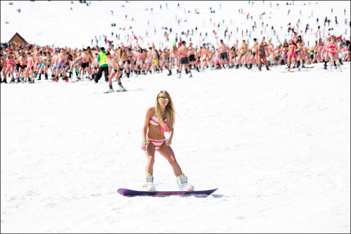 New world record for glamorous swimwear parade on skis and snowboards