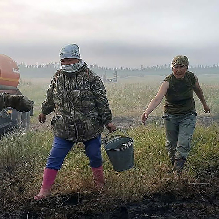 Desperate calls for help from Arctic village of Svatay caged by wildfires 