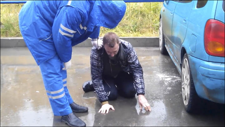 man sits on the ground