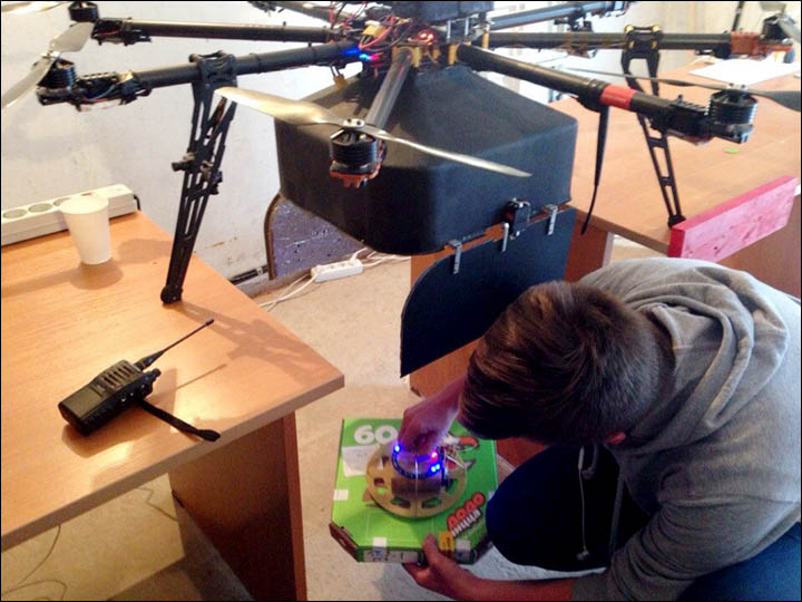 Loading pizza into the drone