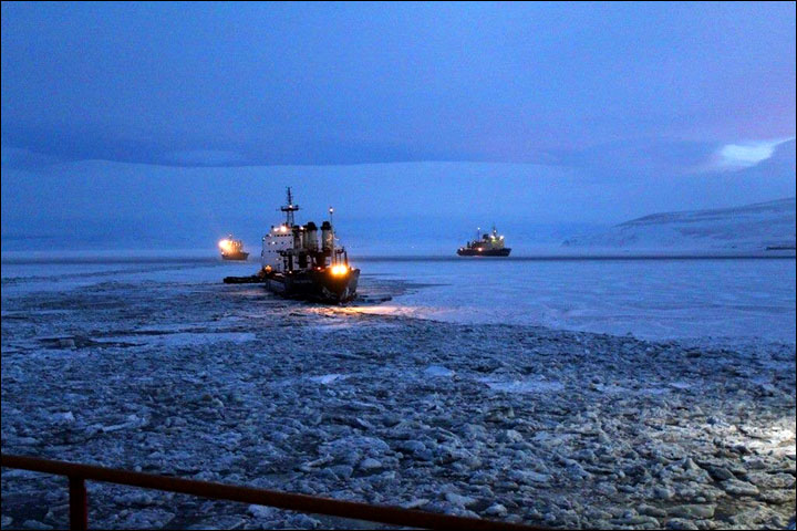 Icebreakers make historic Arctic voyage, then get stuck in frozen sea on return journey 