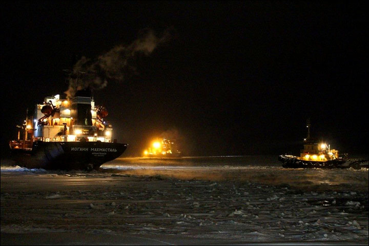 Icebreakers make historic Arctic voyage, then get stuck in frozen sea on return journey 