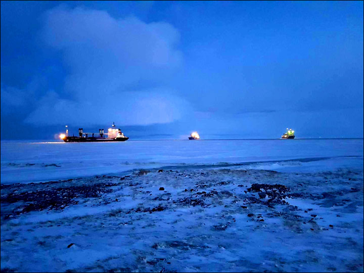 Icebreakers make historic Arctic voyage, then get stuck in frozen sea on return journey 
