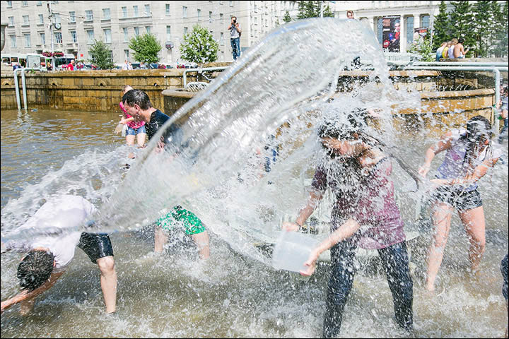 The scene resembles Songkran in Thailand when you are lucky to escape dry.