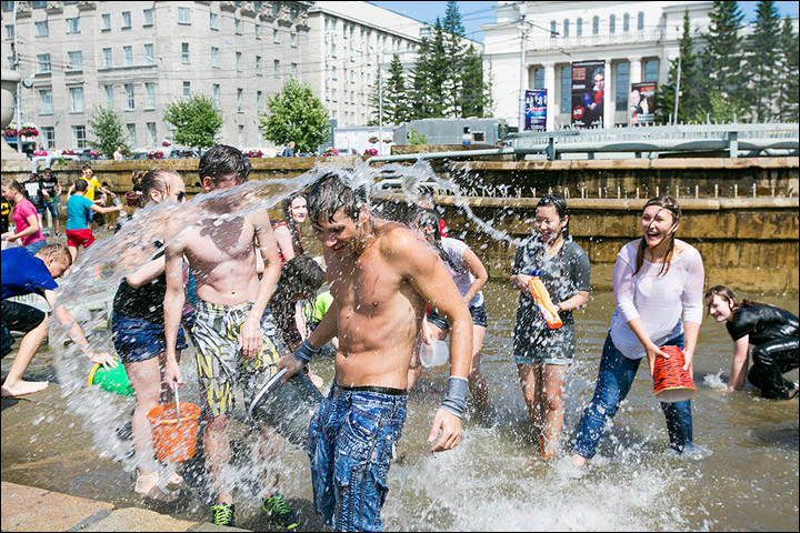 The scene resembles Songkran in Thailand when you are lucky to escape dry.