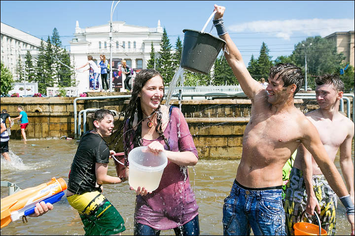 The scene resembles Songkran in Thailand when you are lucky to escape dry.