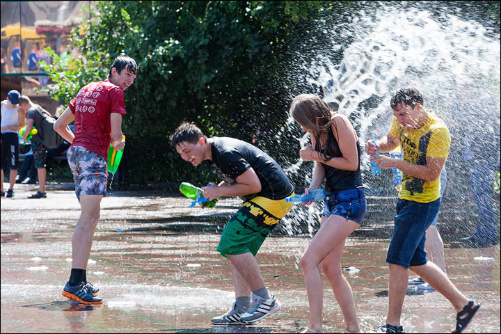 The scene resembles Songkran in Thailand when you are lucky to escape dry.