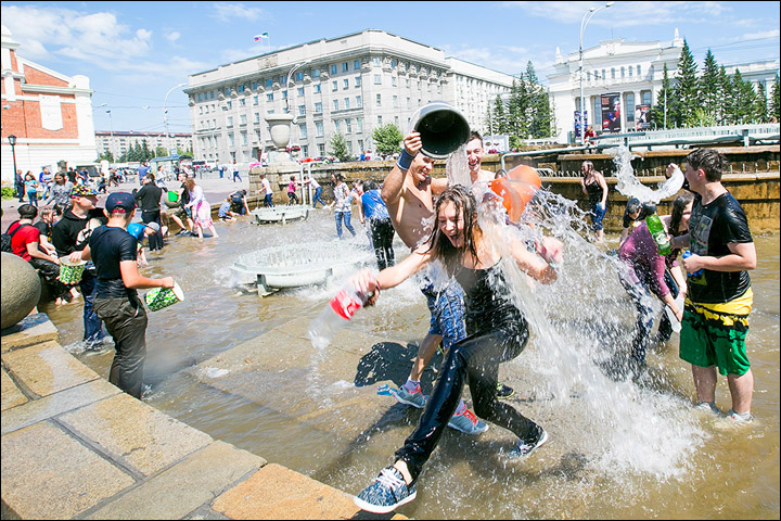 The scene resembles Songkran in Thailand when you are lucky to escape dry.