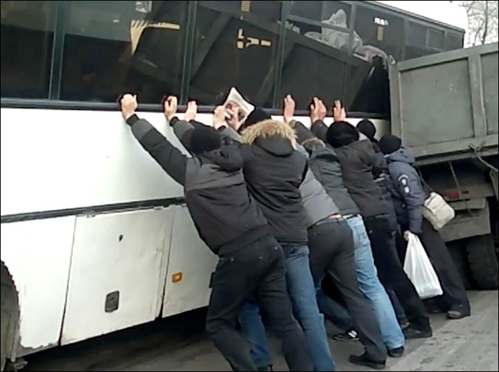 pushing the bus up Kemerovo Siberia