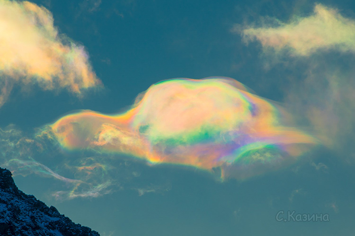 rainbow clouds crown Belukha mountain, Siberia's highest peak