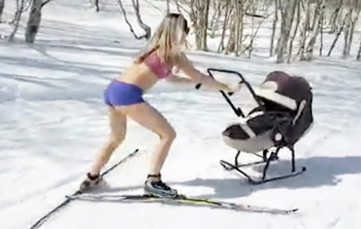 Skiing into shape - applause for video showing young mother’s bikini run with her baby