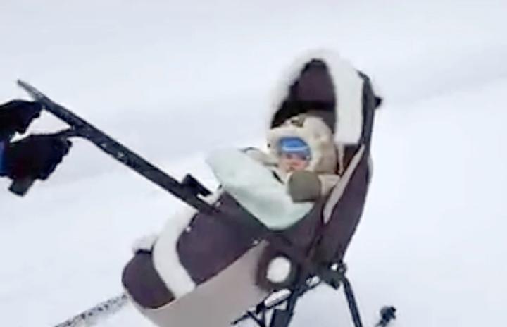 Skiing into shape - applause for video showing young mother’s bikini run with her baby