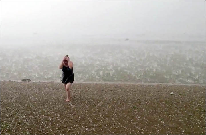Freak hail storm hits Siberian beach in mid-summer - extraordinary pictures