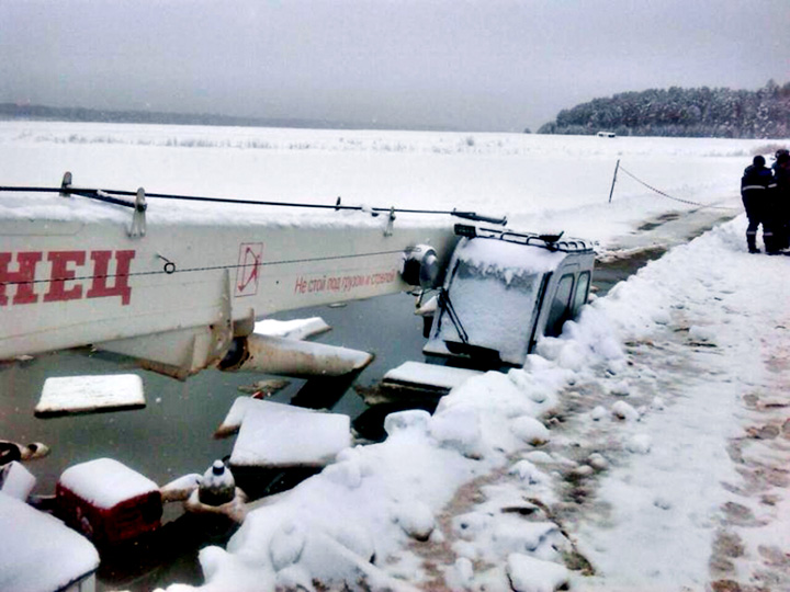 Two huge URAL trucks crashed through ice