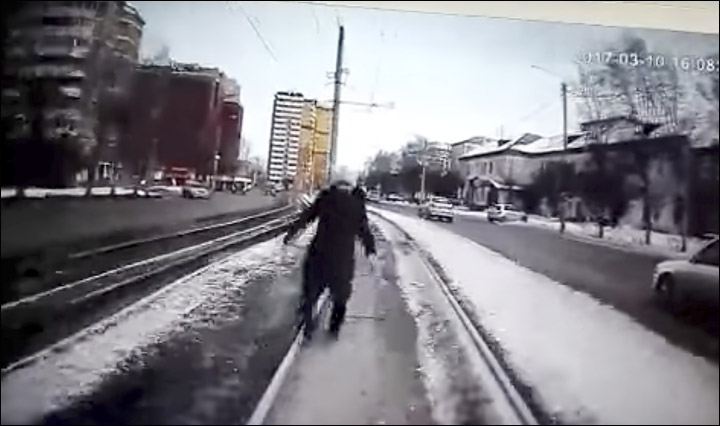 Woman hit by tram