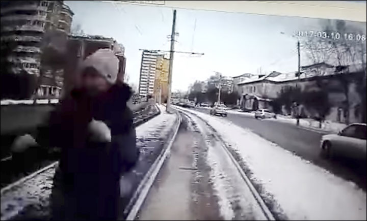 Woman hit by tram