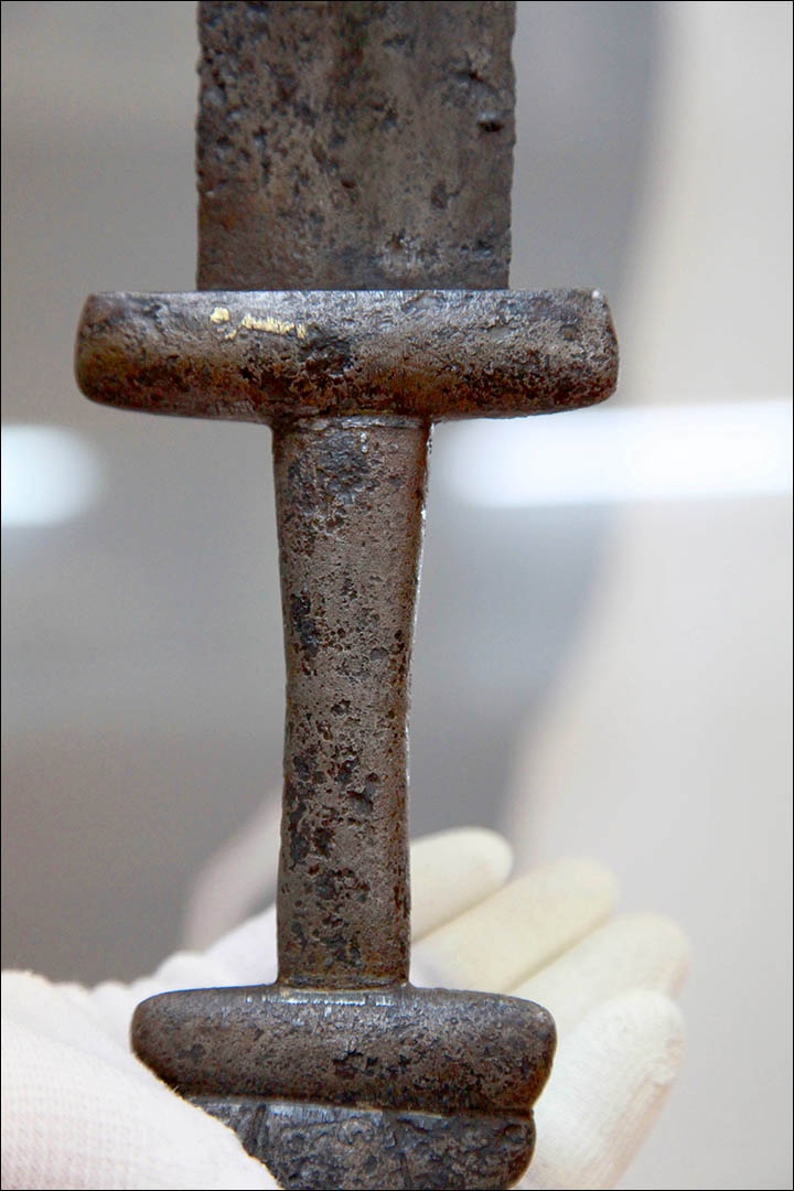 The medieval sword was discovered buried under a tree in Novosibirsk region, and scientists are keen to unlock its secrets.