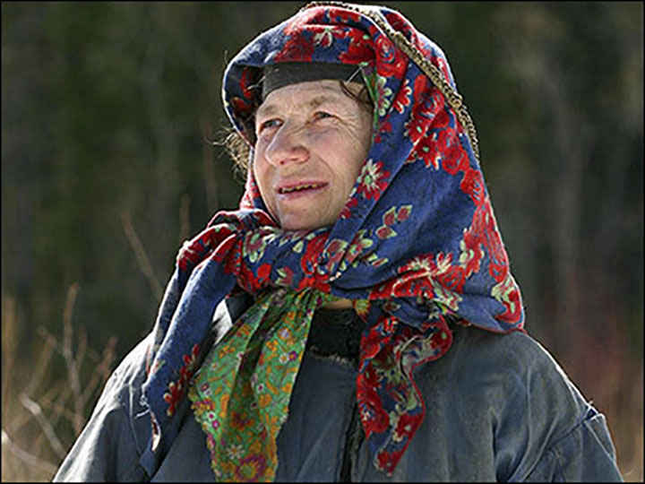 During her stay in ‘civilisation’ when she went to hospital she was unimpressed by modern ways, and yearned to get back home.  'There are so many cars. Why do you need so many?' she asked.  'There's so much smoke from them, there's nothing to breathe.'  She has refused many offers to move to a village over recent decades.  When wild bears get too close she proects herself by banging cutlery on a plate to scare away the beast.