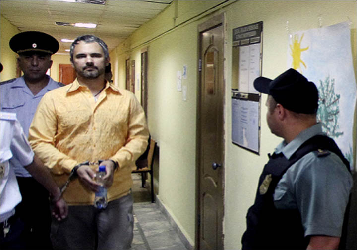 Dmitry Loshagin handcuffed