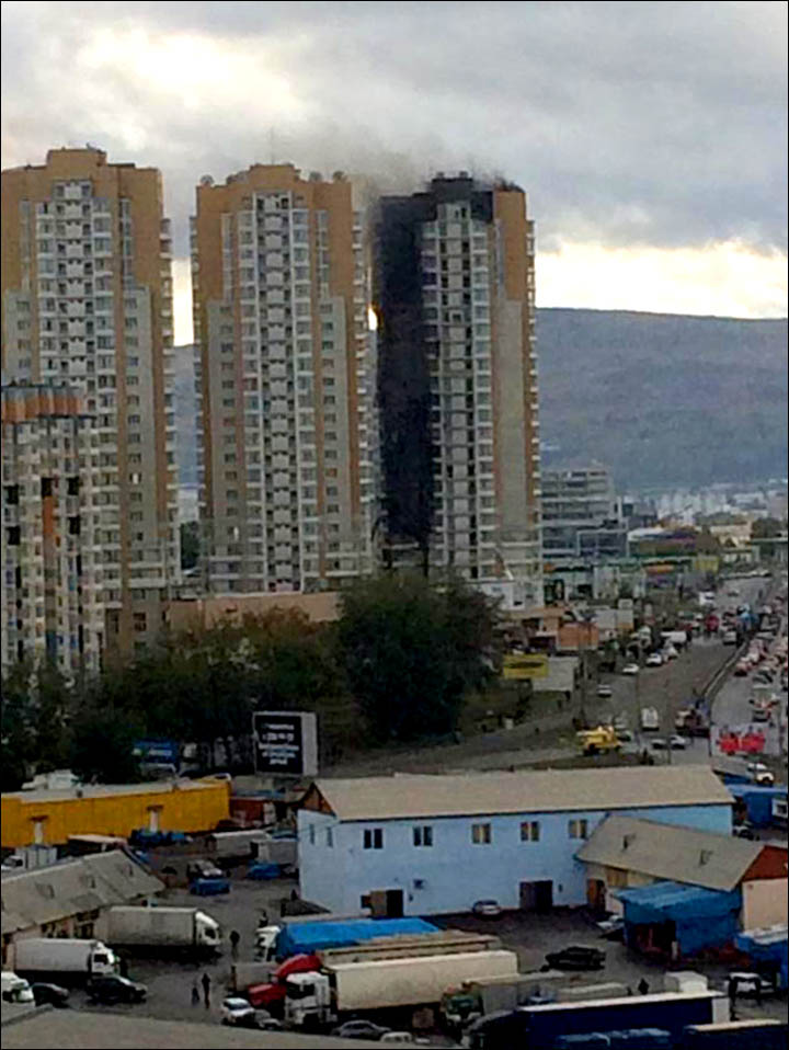 Shocking blaze rips through 25-floor apartment block in Krasnoyarsk