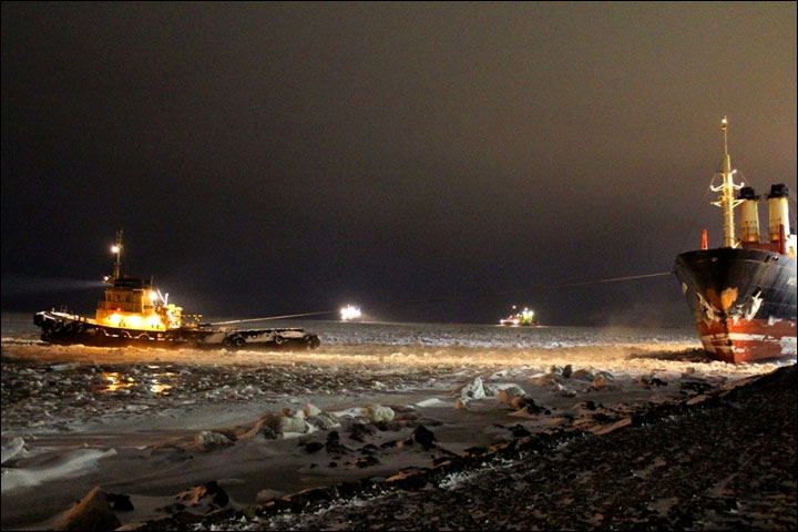 Icebreakers make historic Arctic voyage, then get stuck in frozen sea on return journey 