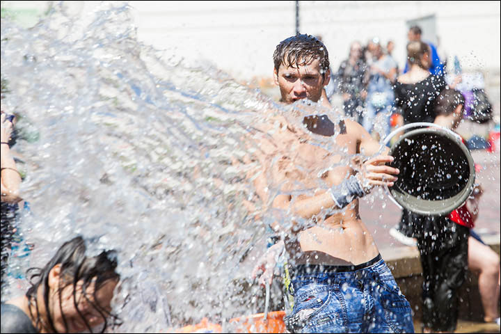 The scene resembles Songkran in Thailand when you are lucky to escape dry.