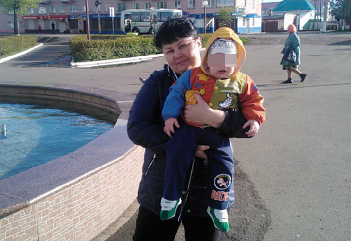 Oksana Uskova with her son Tim