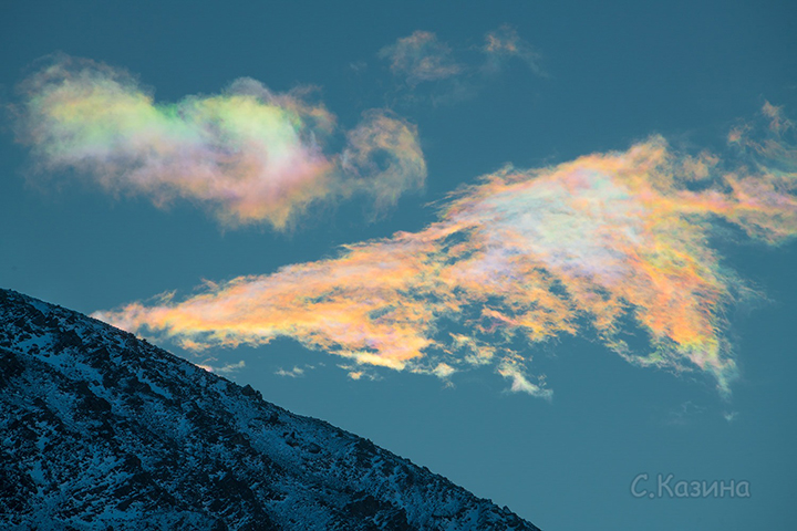 rainbow clouds crown Belukha mountain, Siberia's highest peak