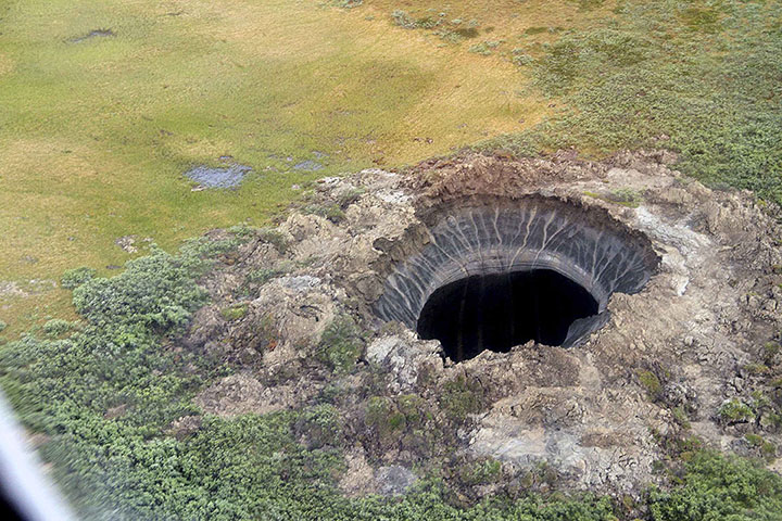 Giant new 50-metre deep crater opens up after explosion in Arctic tundra