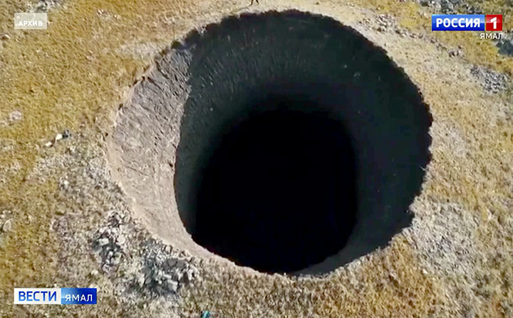 Giant new 50-metre deep crater opens up after explosion in Arctic tundra 