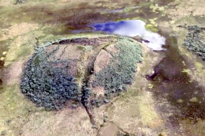 Giant new 50-metre deep crater opens up after explosion in Arctic tundra 