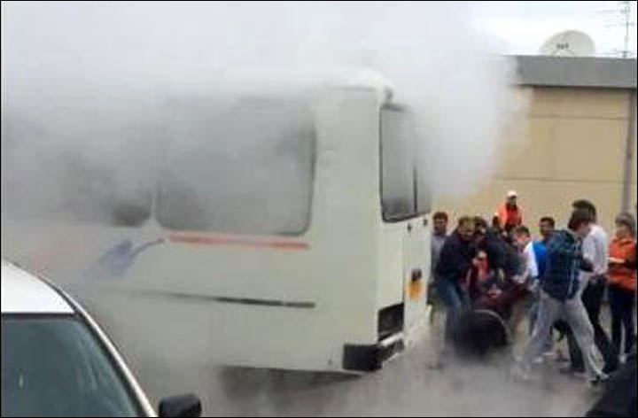 Packed minibus filled with boiling water after 'geyser' bursts through Siberian street
