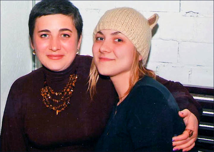 widow Olga Kurochkina with daughter Nastya