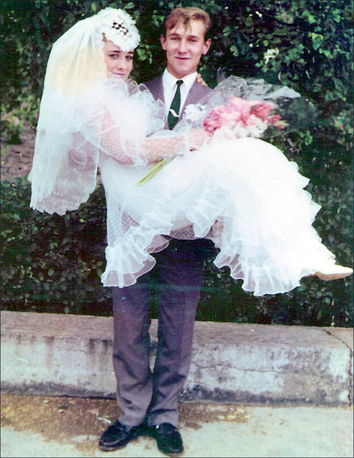 Olga Kurochkina with her husband on their wedding day